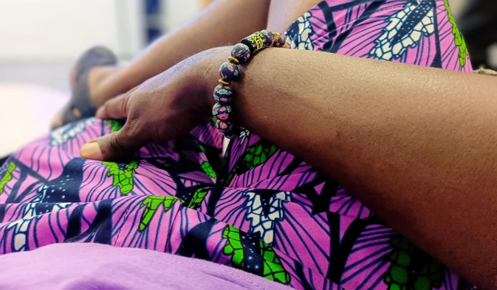 Lilac and pink in t-shirt and tribal print shorts. 